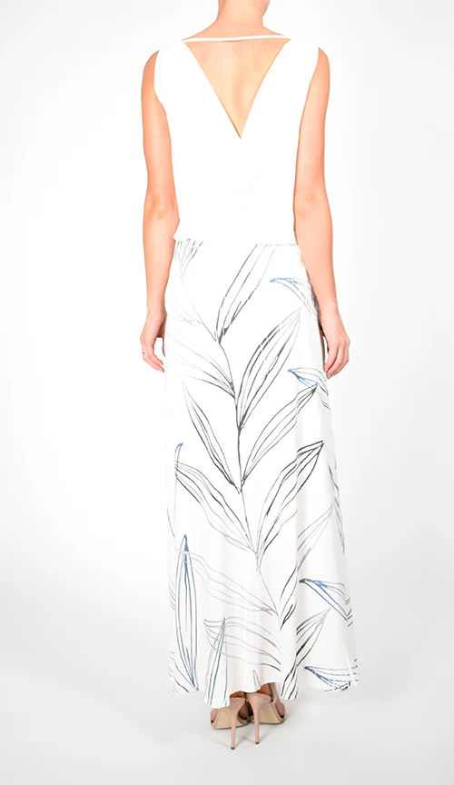 White Sleeveless Top and Leaf - Print Maxi Skirt Ensemble