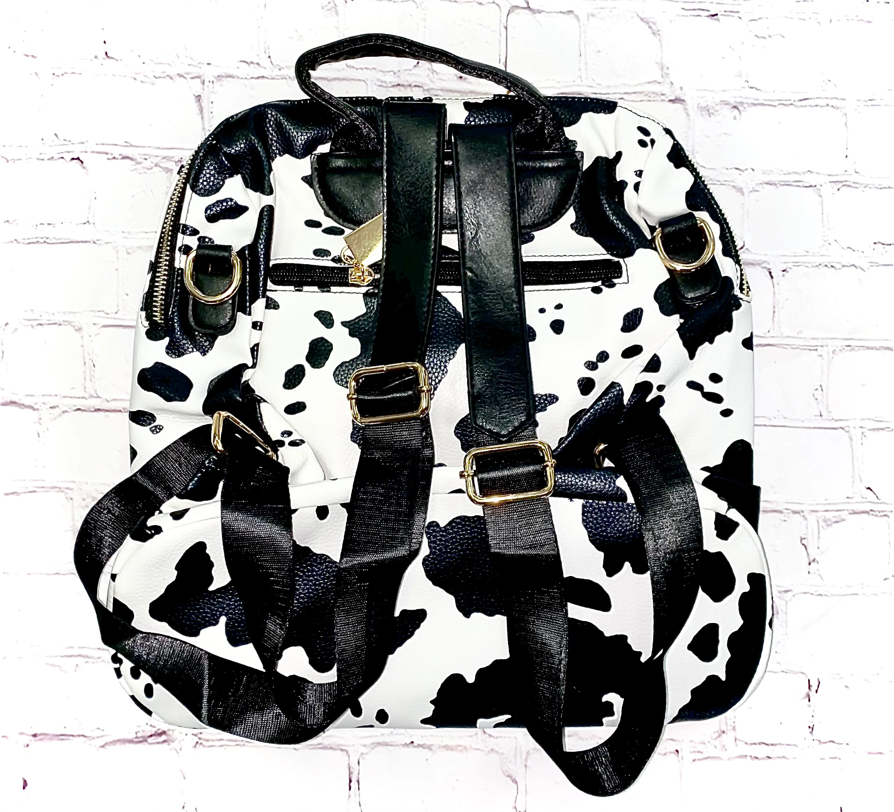 Cow Print Multifunctional Backpack + Wristlet