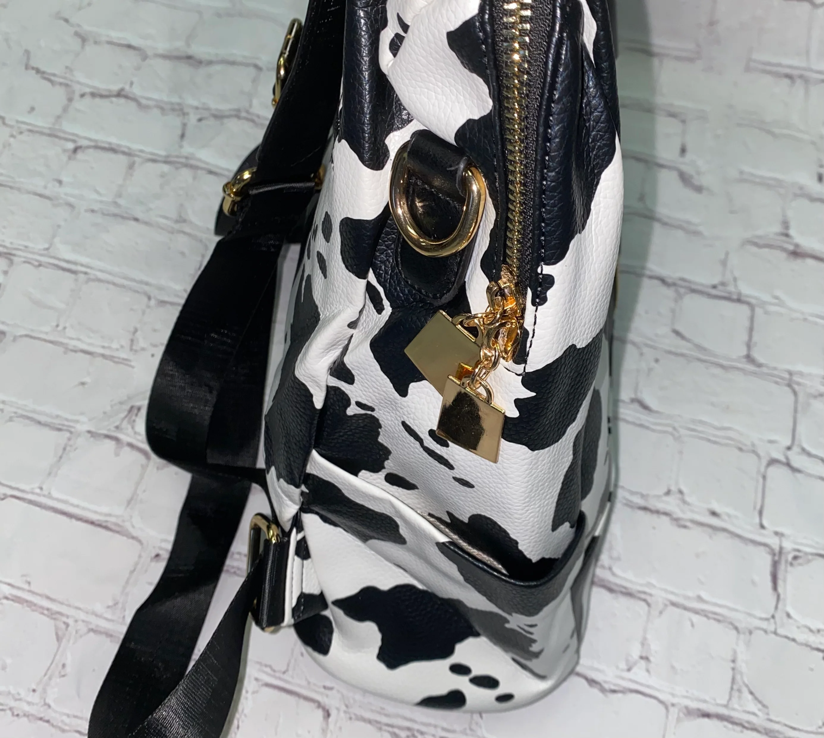 Cow Print Multifunctional Backpack + Wristlet