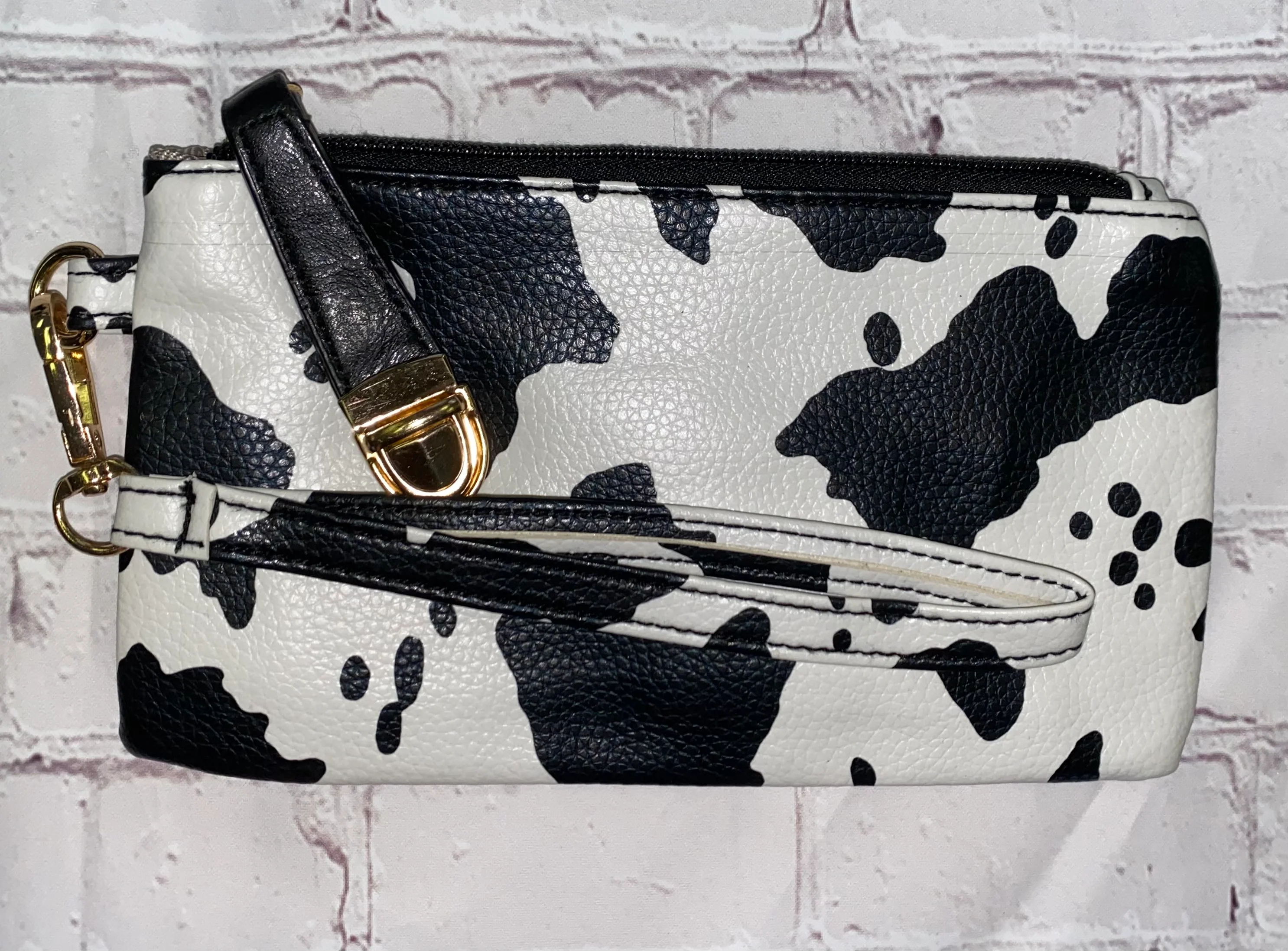 Cow Print Multifunctional Backpack + Wristlet