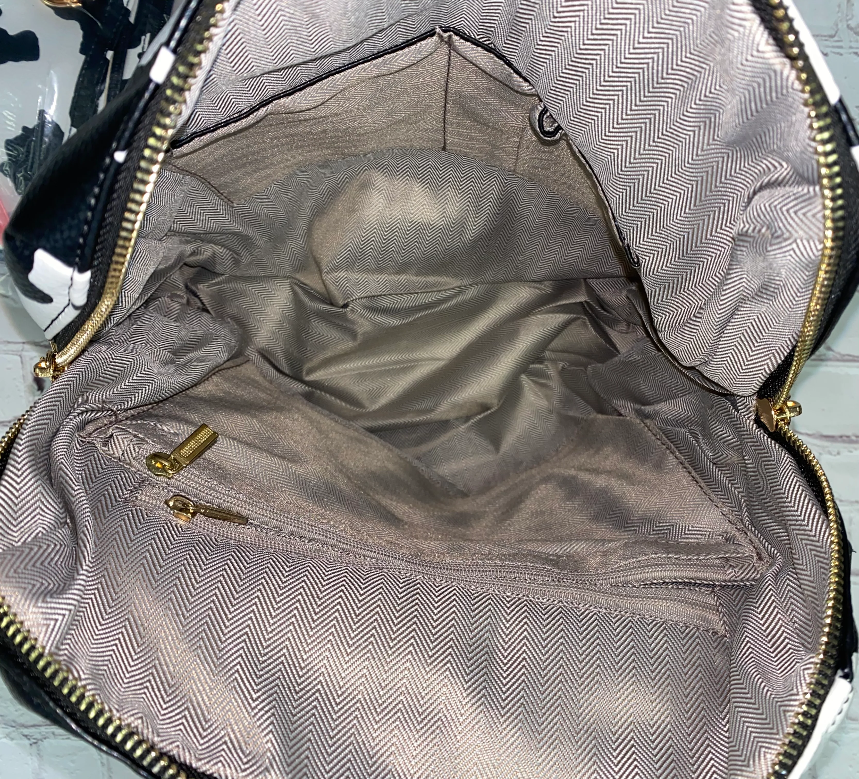 Cow Print Multifunctional Backpack + Wristlet